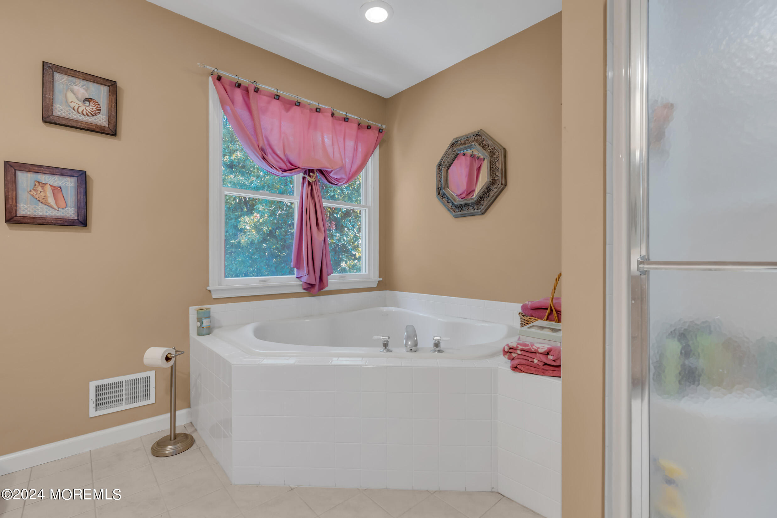 24 Ryjac Court Brick, NJ 08724 - Photo 33 of 57 a bathroom with a bathtub and a shower