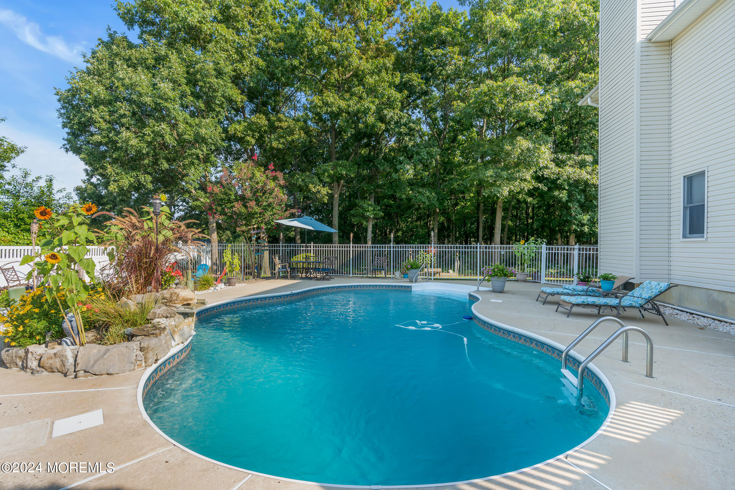 24 Ryjac Court Brick, NJ 08724 - Photo 41 of 57 a view of a swimming pool with a patio