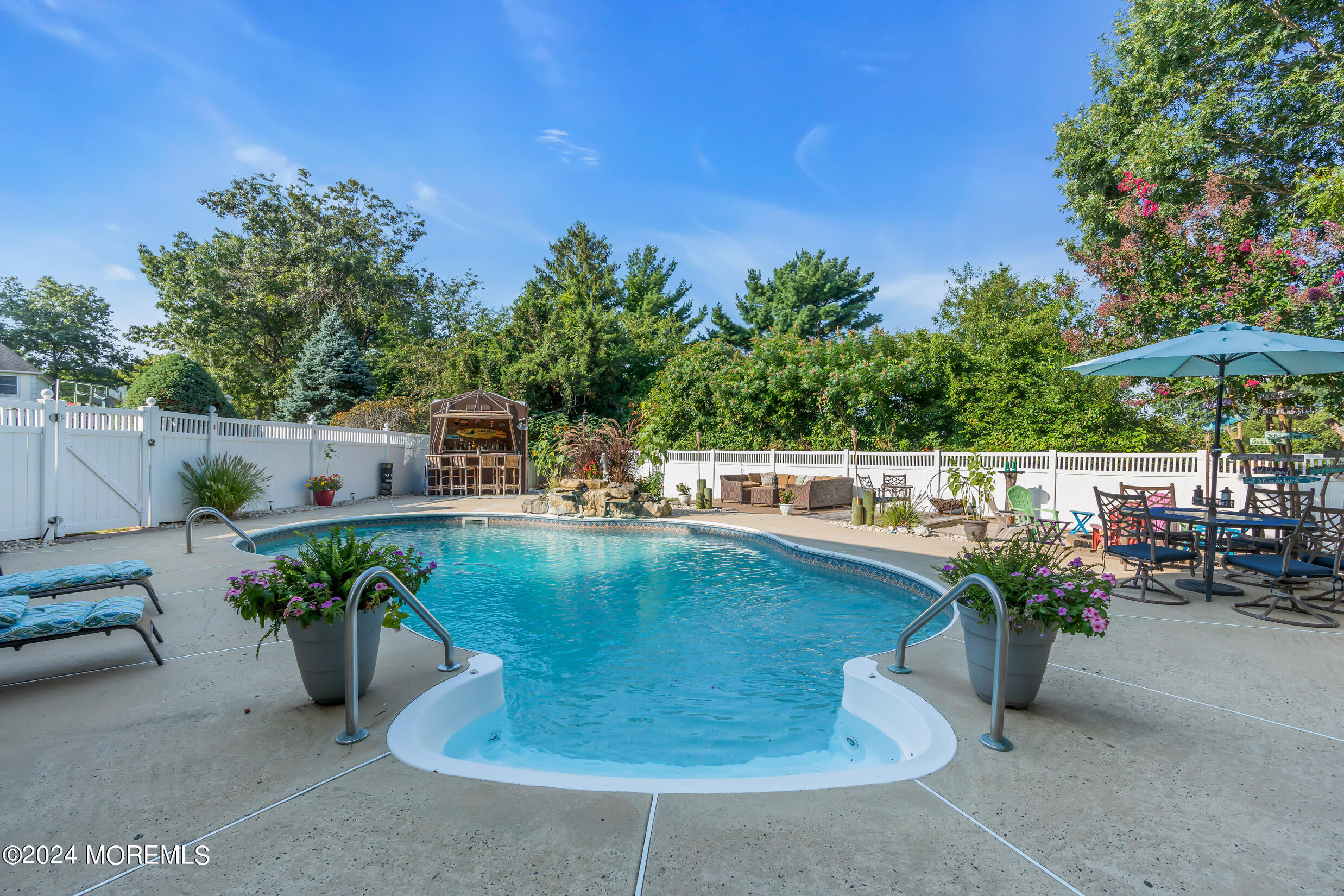 24 Ryjac Court Brick, NJ 08724 - Photo 46 of 57 a view of a swimming pool with a patio