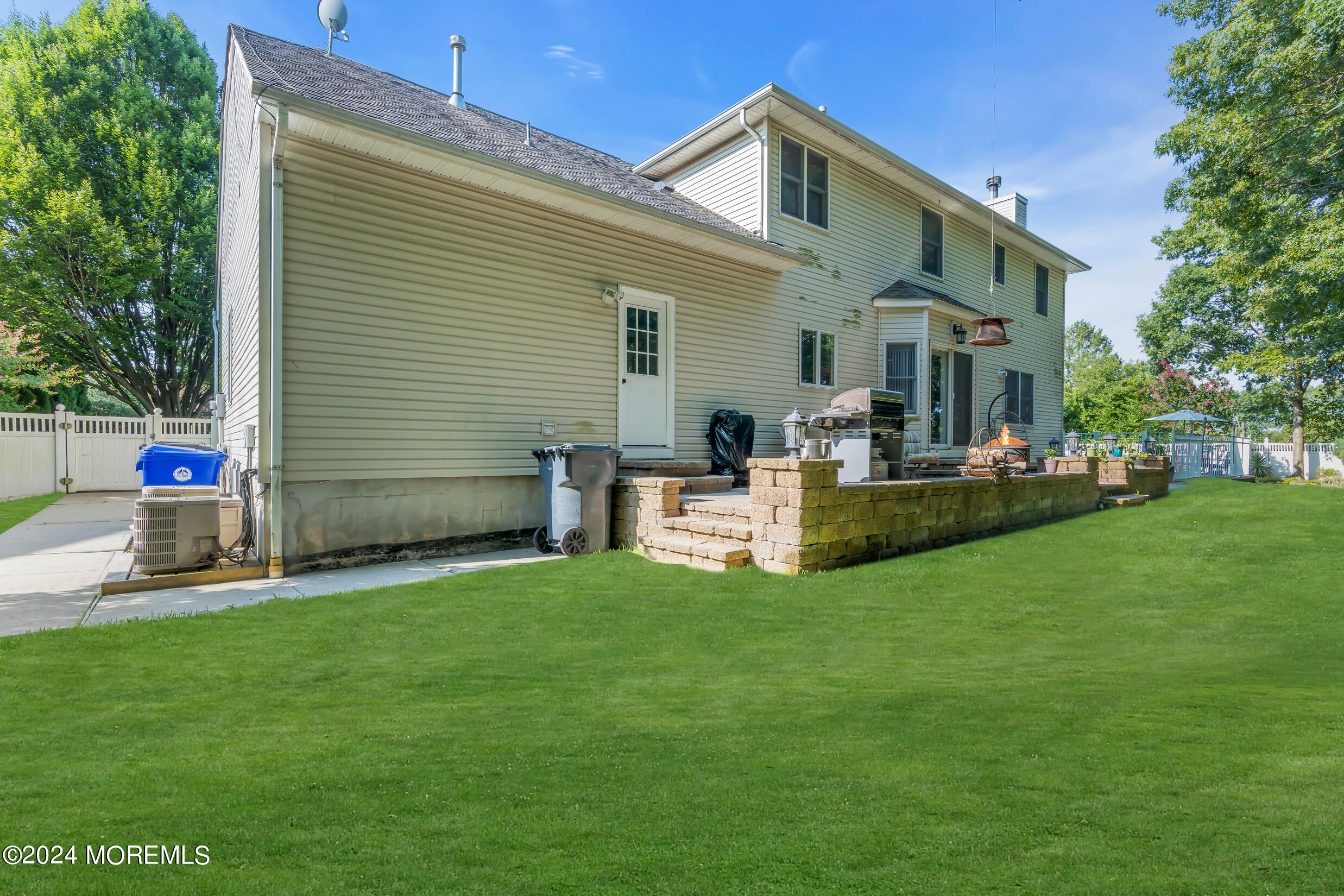 24 Ryjac Court Brick, NJ 08724 - Photo 49 of 57 a view of a house with a patio