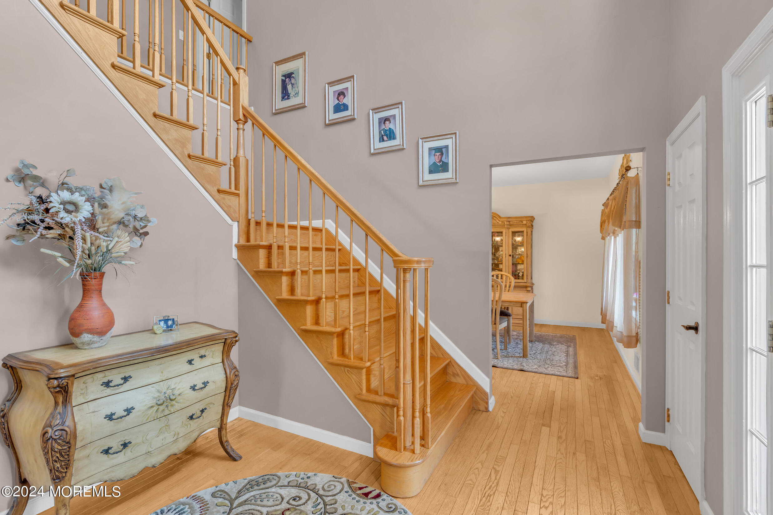 24 Ryjac Court Brick, NJ 08724 - Photo 7 of 57 a view of entryway and hall with wooden floor