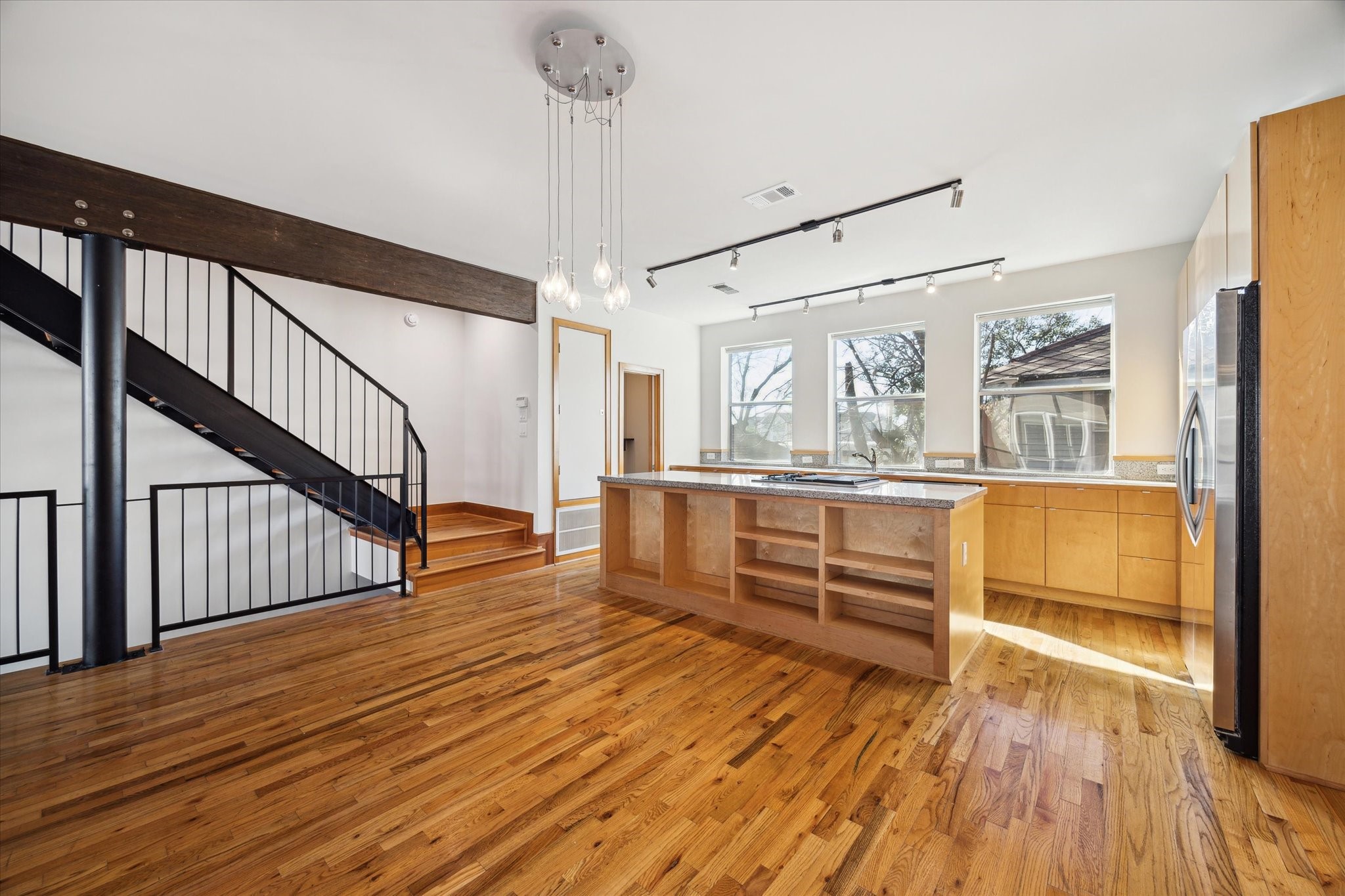 94 Drew Street, Unit C Houston, TX 77006 - Photo 11 of 29 Comfortable, light-filled open spaces designed for effortless flow and everyday living, offering a welcoming balance of function, flexibility, and style.