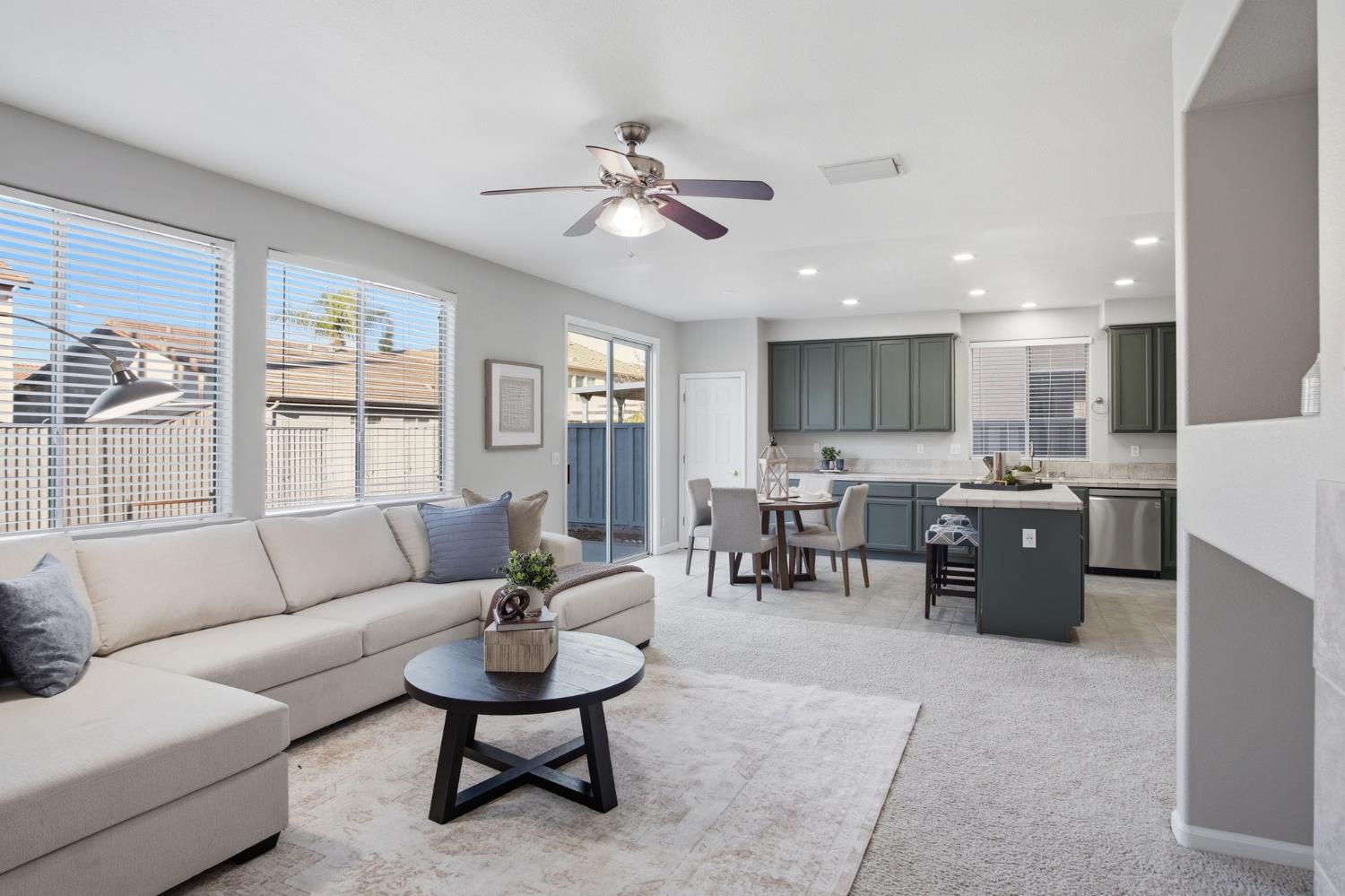 2403 Clemente Lane Tracy, CA 95377 - Photo 13 of 43 a living room with furniture and a large window