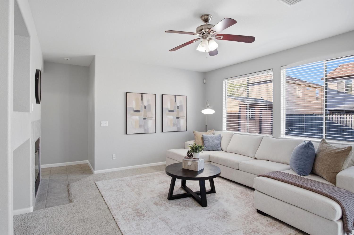 2403 Clemente Lane Tracy, CA 95377 - Photo 15 of 43 a living room with furniture and a large window