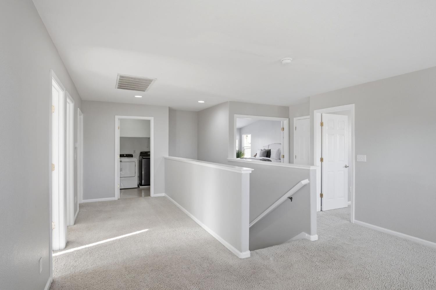 2403 Clemente Lane Tracy, CA 95377 - Photo 20 of 43 a view of a kitchen with refrigerator and a sink