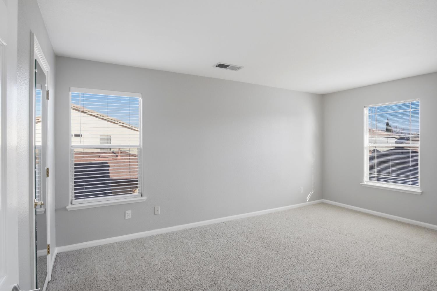 2403 Clemente Lane Tracy, CA 95377 - Photo 21 of 43 a view of an empty room with a window