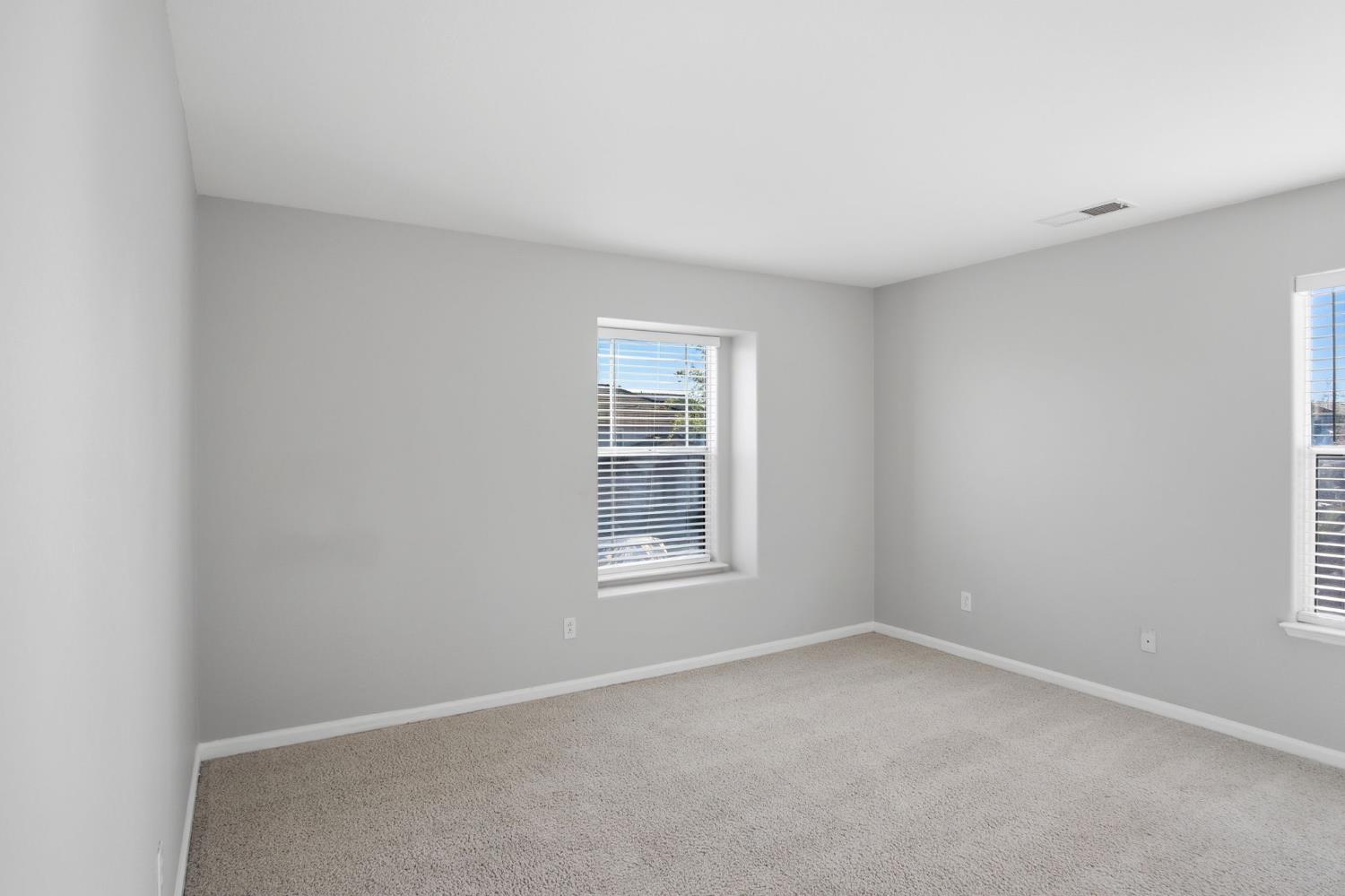 2403 Clemente Lane Tracy, CA 95377 - Photo 22 of 43 an empty room with a window