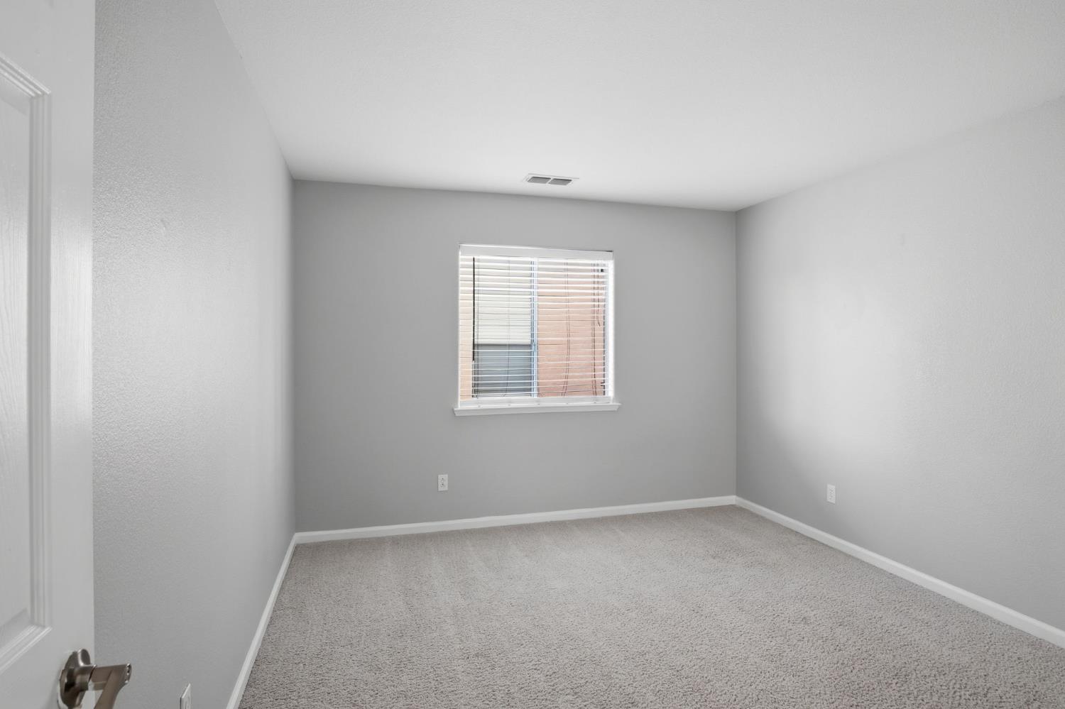 2403 Clemente Lane Tracy, CA 95377 - Photo 24 of 43 an empty room with a window