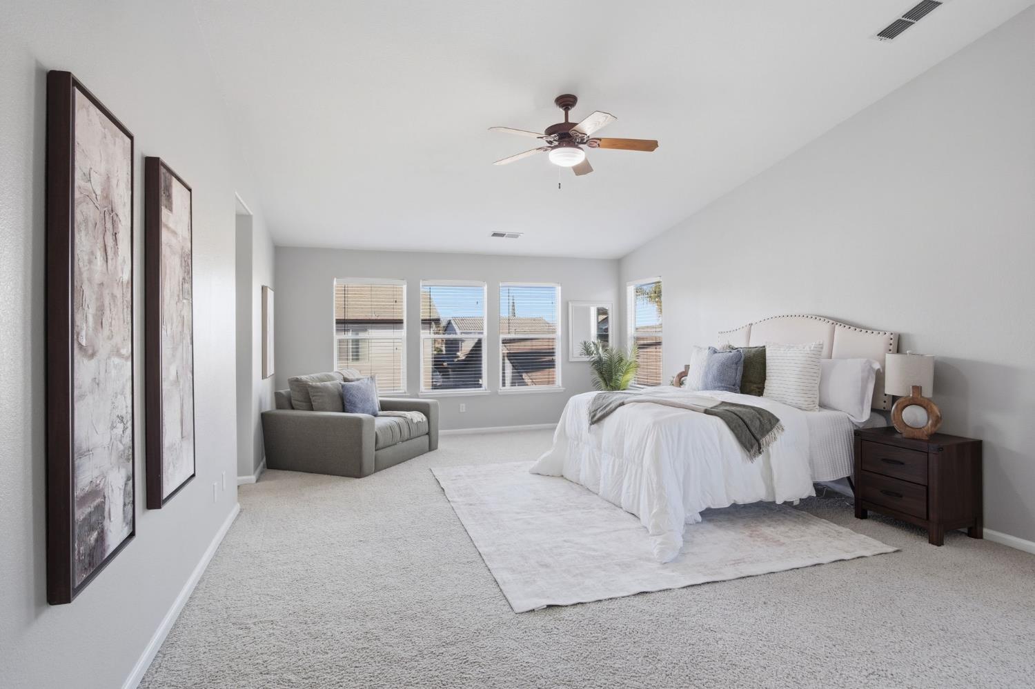 2403 Clemente Lane Tracy, CA 95377 - Photo 26 of 43 a bedroom with bed and large window