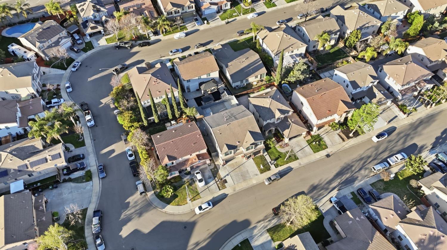 2403 Clemente Lane Tracy, CA 95377 - Photo 37 of 43 an aerial view of a house with a yard and garden