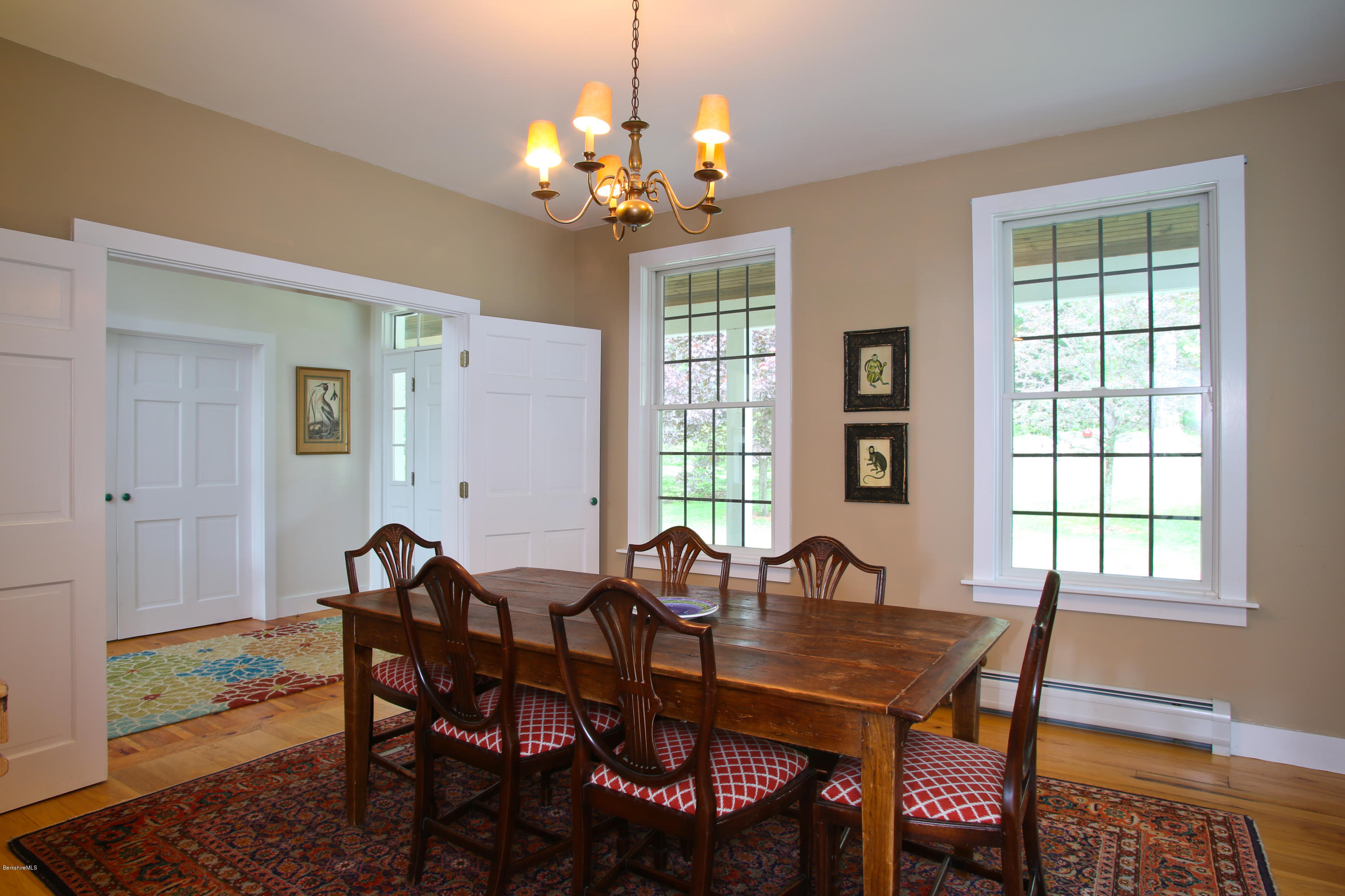 238 Rossiter Road Richmond, MA 01254 - Photo 14 of 41 a view of a dining room with furniture and chandelier