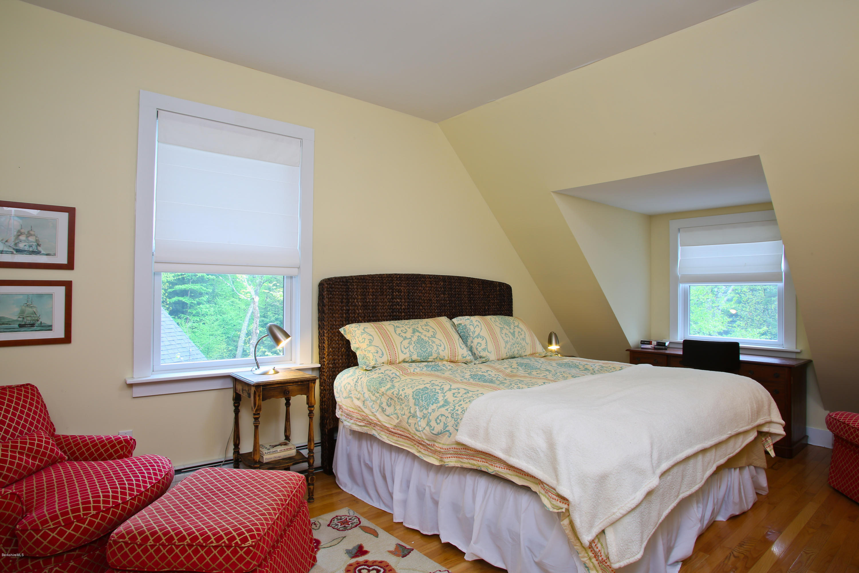 238 Rossiter Road Richmond, MA 01254 - Photo 21 of 41 a bedroom with a bed couch and a window