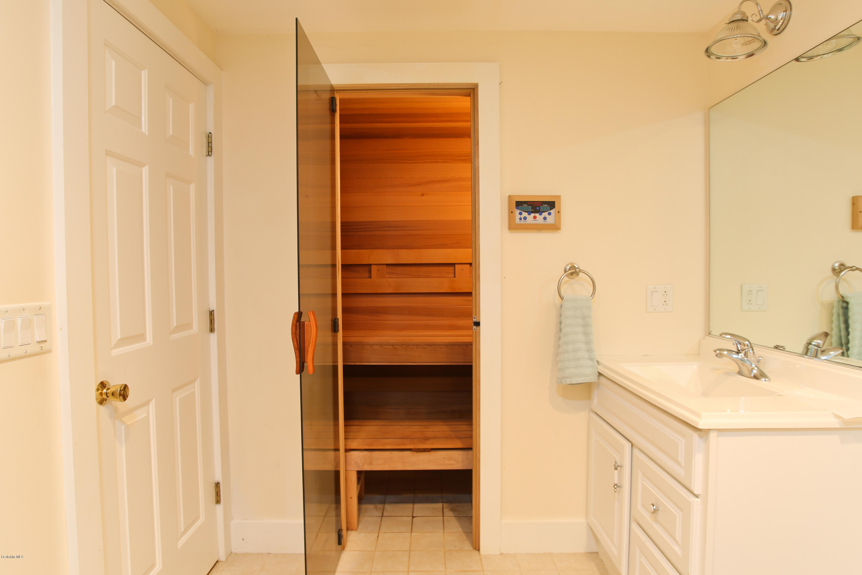 238 Rossiter Road Richmond, MA 01254 - Photo 25 of 41 a bathroom with a sink and a mirror