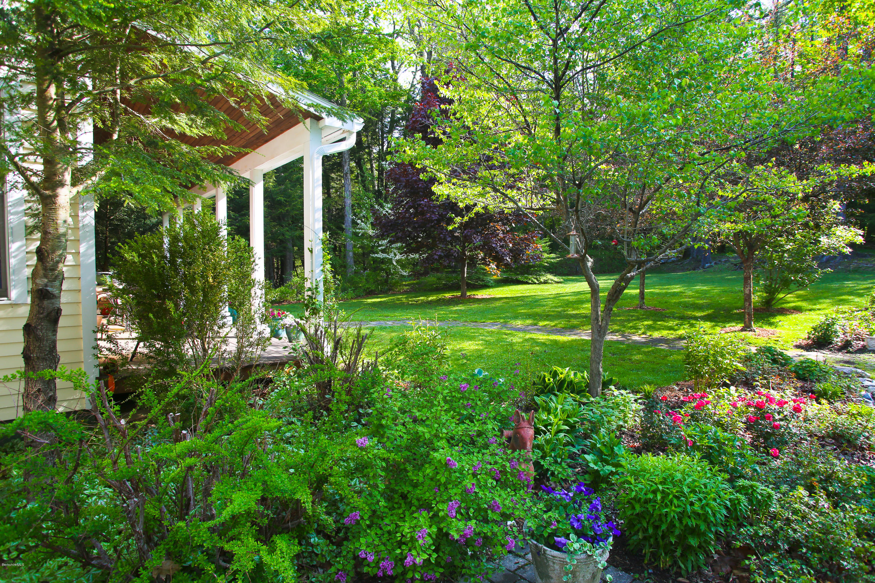 238 Rossiter Road Richmond, MA 01254 - Photo 31 of 41 a view of a house with big yard and garden