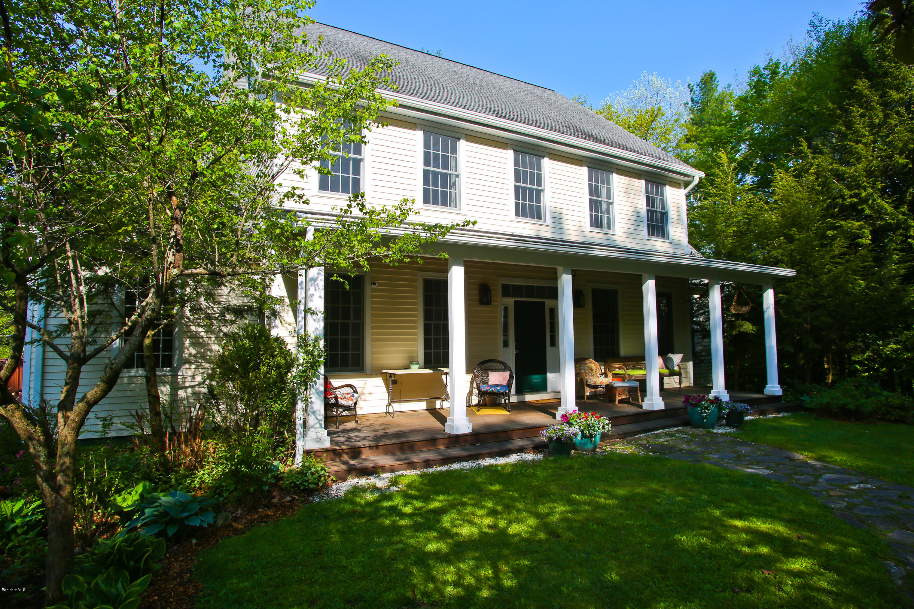 238 Rossiter Road Richmond, MA 01254 - Photo 6 of 41 front view of a house with a patio and a yard