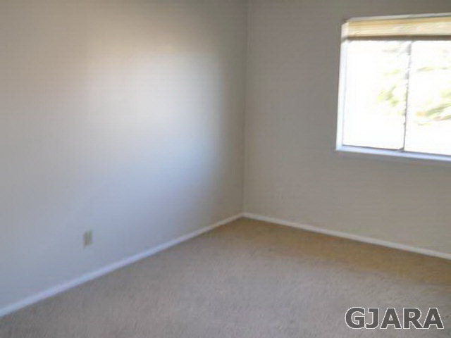 1301 20 Road Fruita, CO 81521 - Photo 6 of 15 an empty room with a window