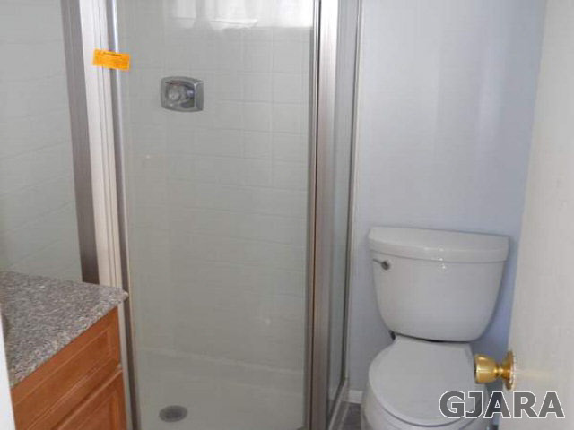 1301 20 Road Fruita, CO 81521 - Photo 7 of 15 a bathroom with a toilet and a shower