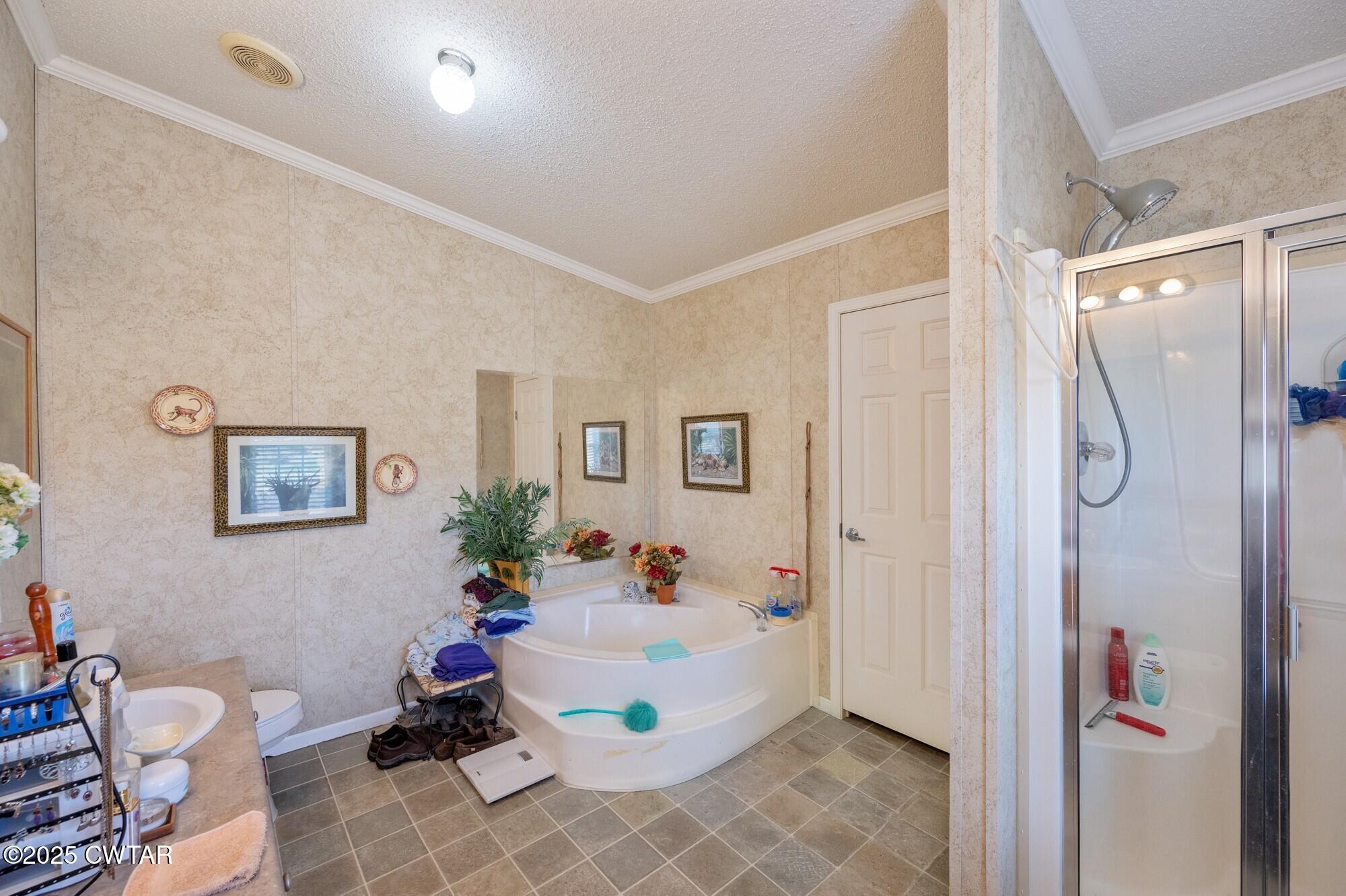 416 Haney School Road Decaturville, TN 38329 - Photo 15 of 35 a living room with furniture and a table
