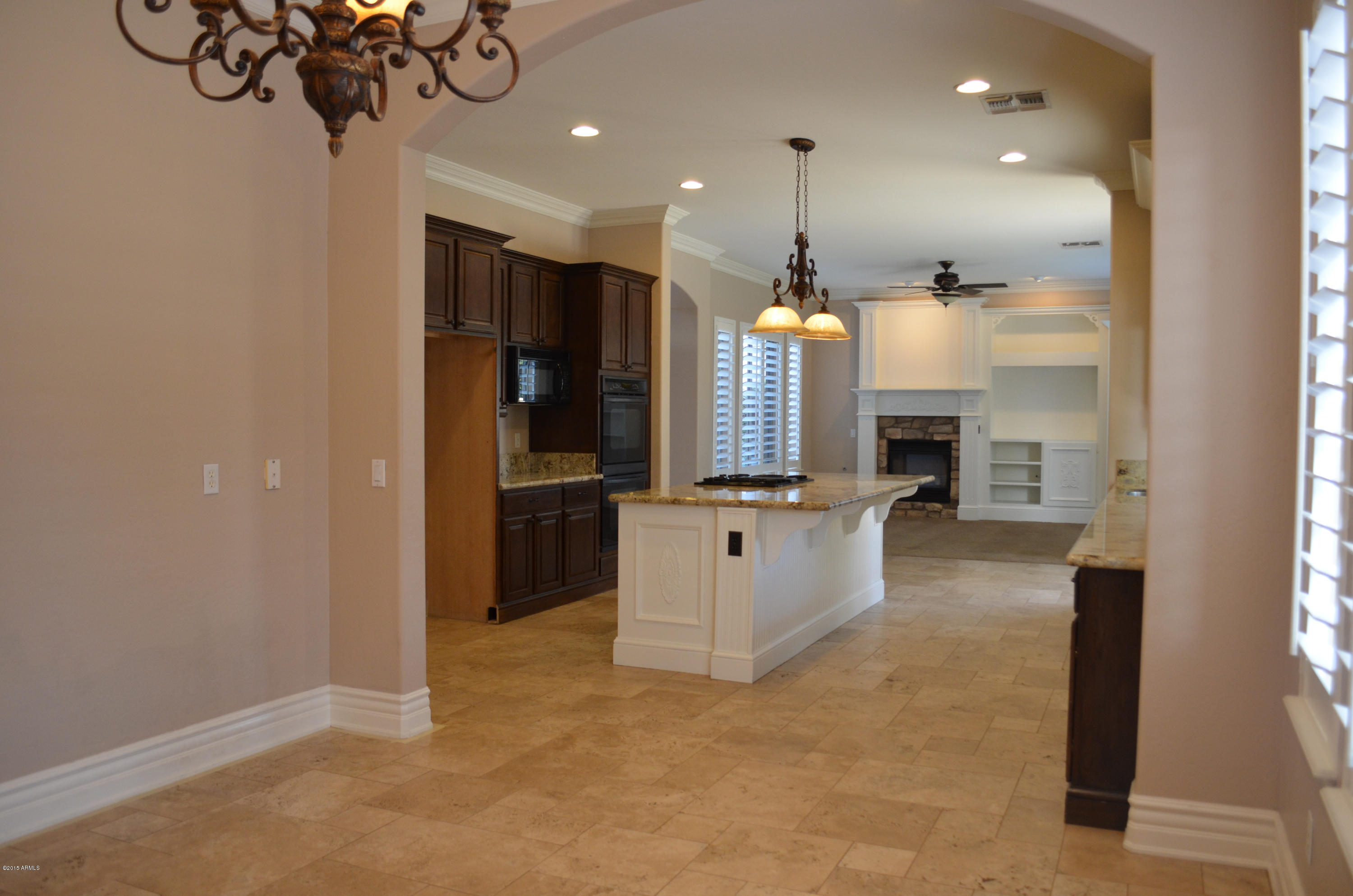 2941 Washington Avenue Gilbert, AZ 85234 - Photo 21 of 57 a large kitchen with a large counter top appliances and cabinets