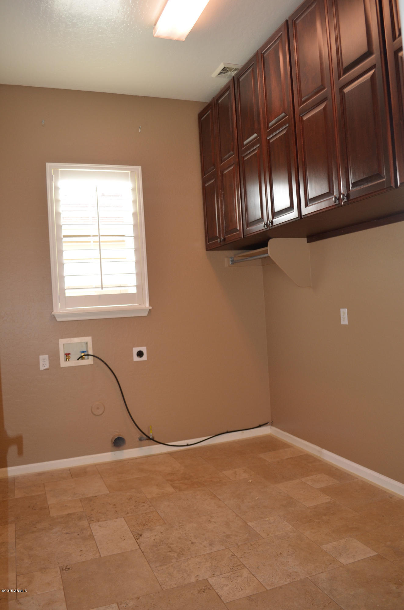 2941 Washington Avenue Gilbert, AZ 85234 - Photo 23 of 57 a view of an empty room with a window