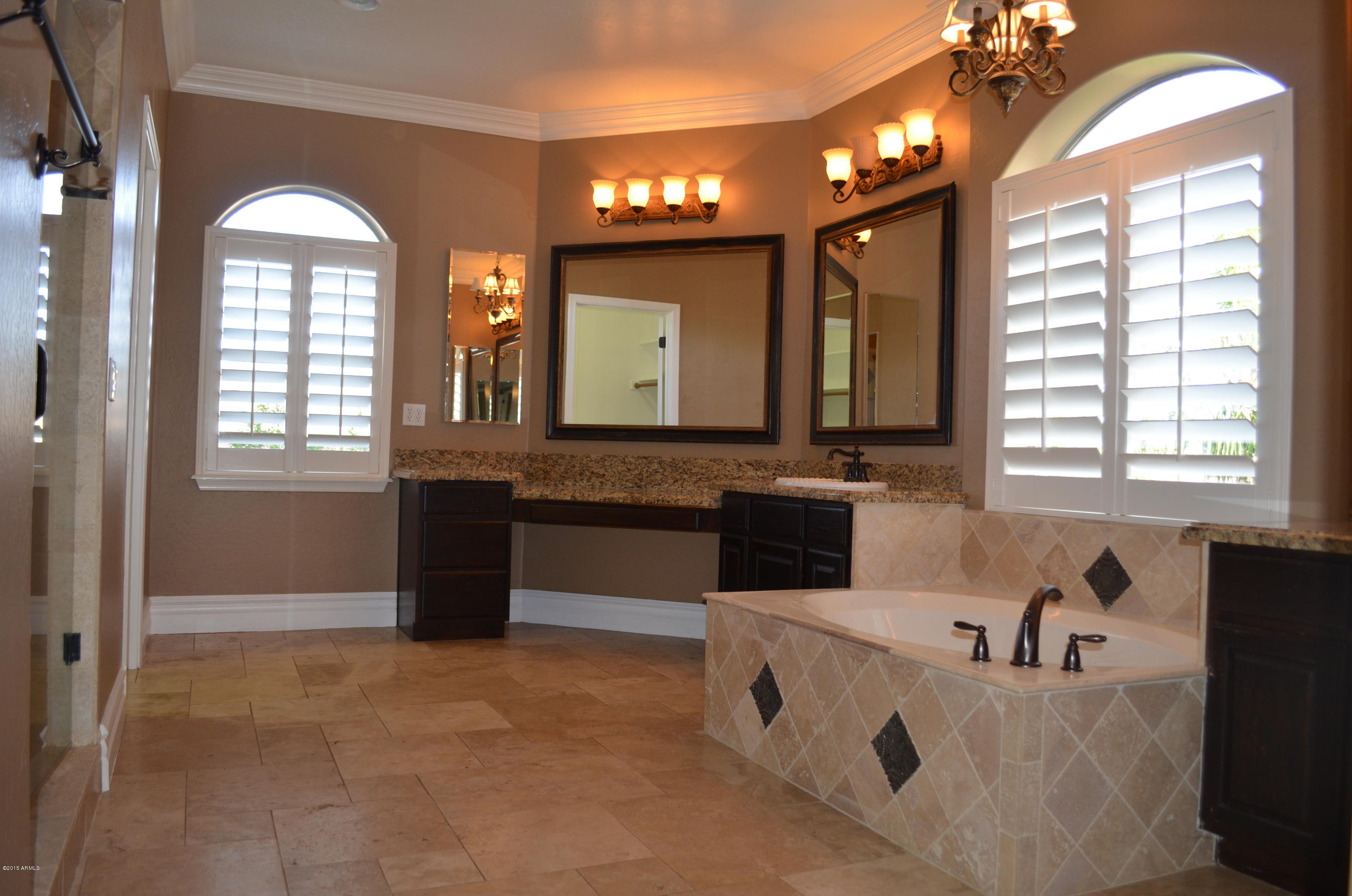 2941 Washington Avenue Gilbert, AZ 85234 - Photo 29 of 57 a bathroom with a sink and a mirror
