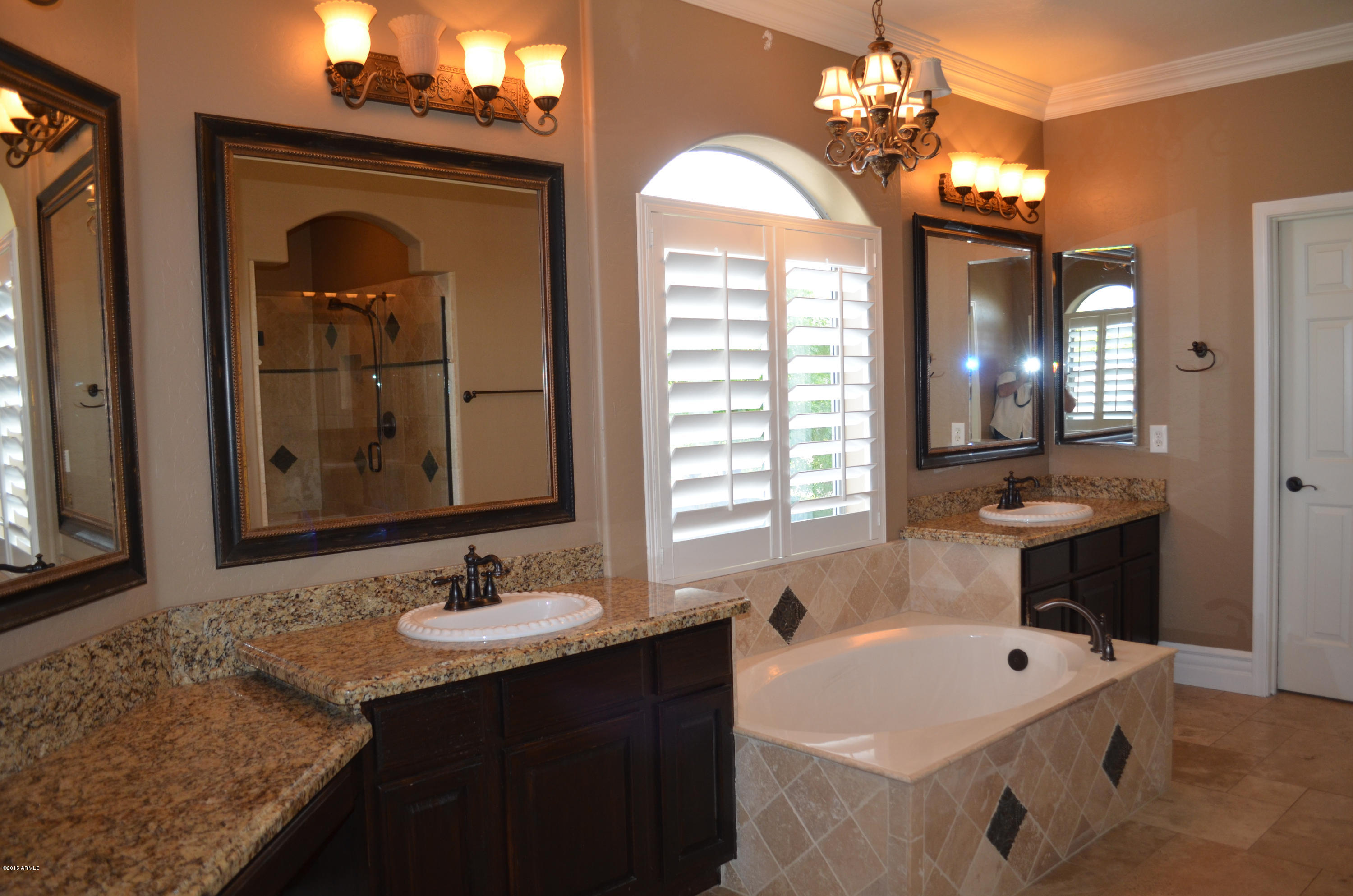 2941 Washington Avenue Gilbert, AZ 85234 - Photo 34 of 57 a bathroom with a sink and a mirror