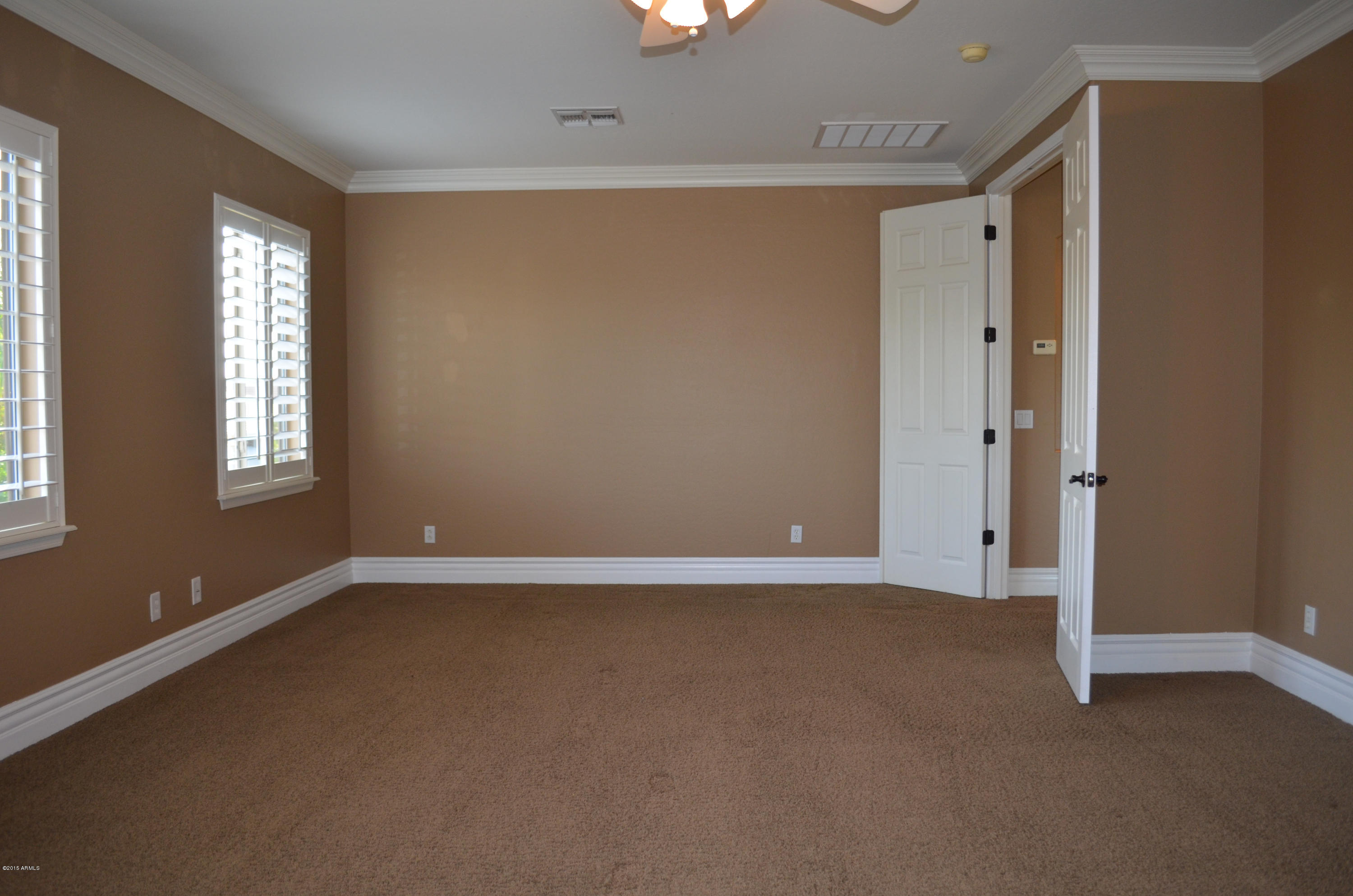 2941 Washington Avenue Gilbert, AZ 85234 - Photo 36 of 57 a view of an empty room with a window