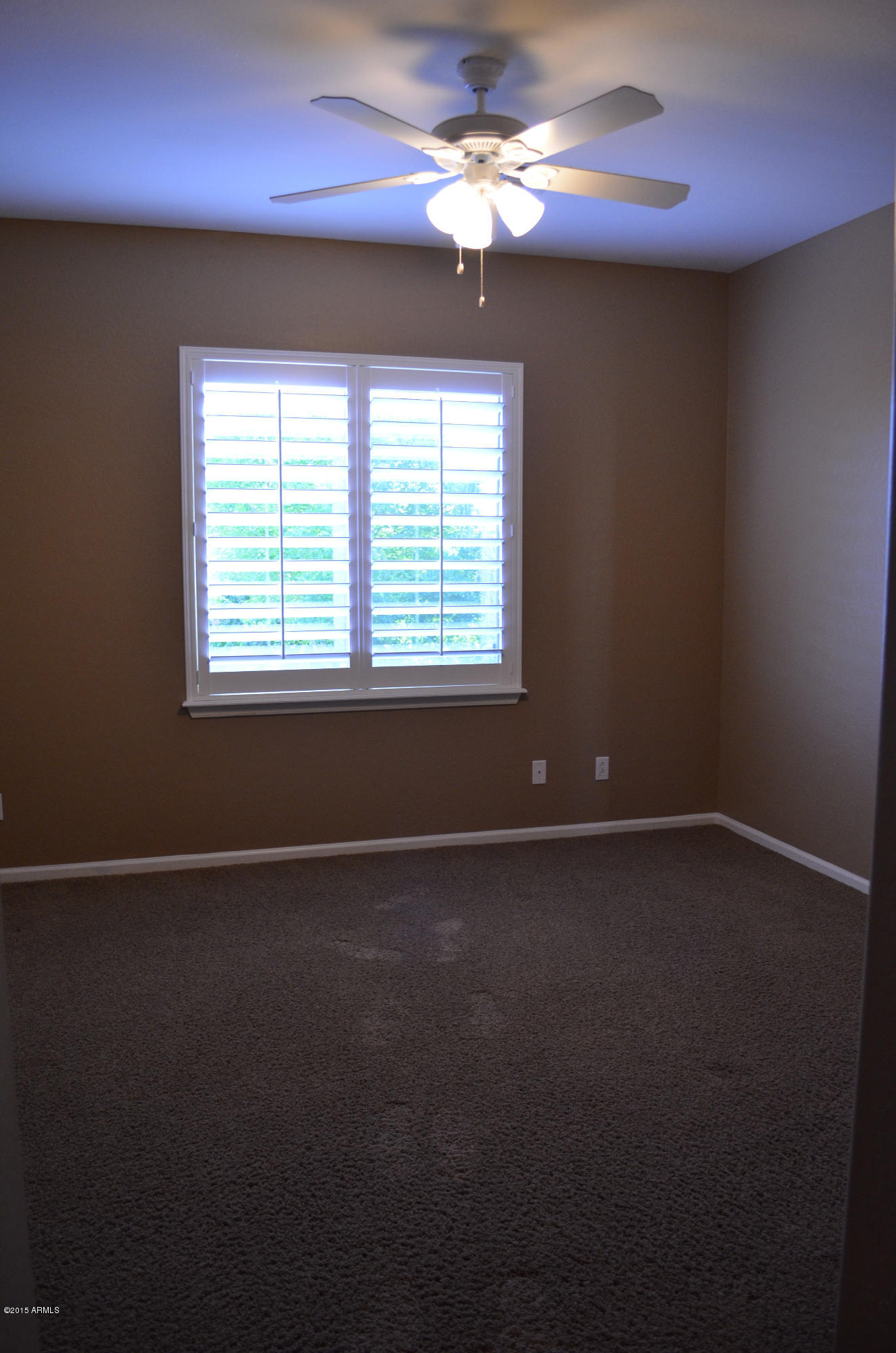 2941 Washington Avenue Gilbert, AZ 85234 - Photo 42 of 57 a view of an empty room with a window