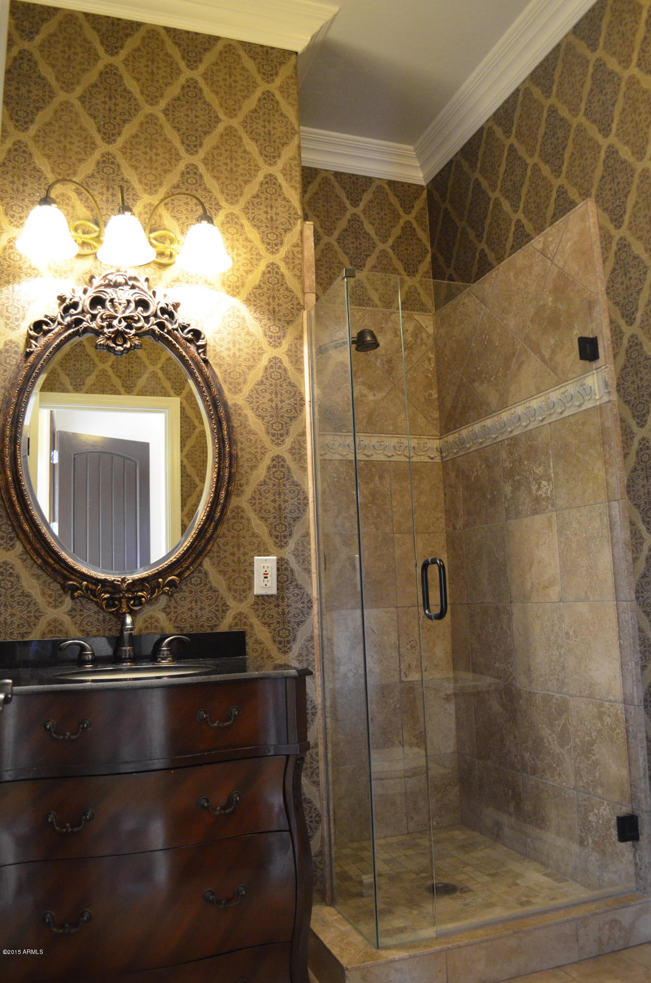 2941 Washington Avenue Gilbert, AZ 85234 - Photo 6 of 57 a bathroom with a sink and a mirror