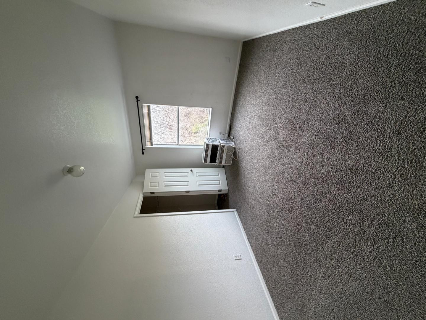 2957 Doc Mackey Road, Unit MNFD Camp Verde, AZ 86322 - Photo 12 of 13 a bedroom with a bed and a window