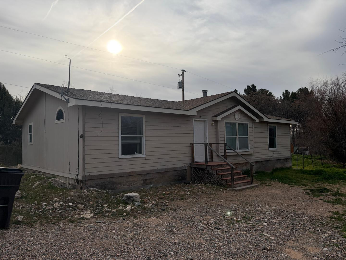 2957 Doc Mackey Road, Unit MNFD Camp Verde, AZ 86322 - Photo 2 of 13 a front view of a house with garden
