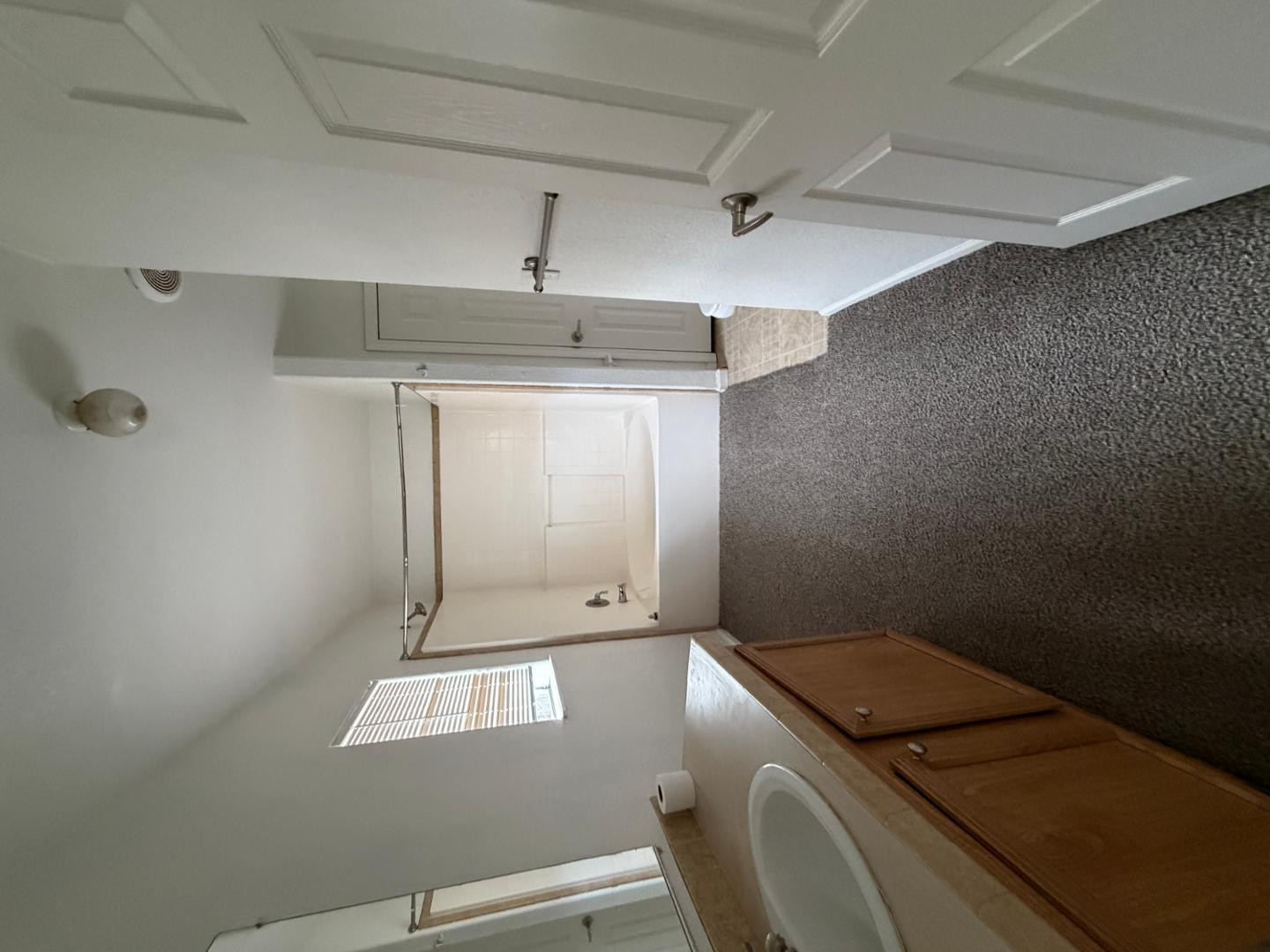 2957 Doc Mackey Road, Unit MNFD Camp Verde, AZ 86322 - Photo 4 of 13 a room with a wooden floor and white walls