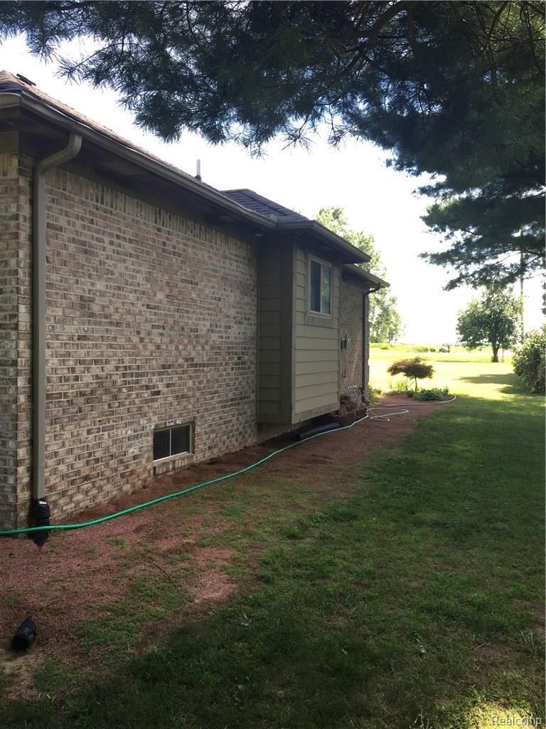 21325 24 Mile Road Macomb, MI 48042 - Photo 35 of 38 West side of the house