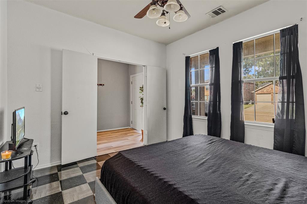 503 Pinto Lane Forney, TX 75126 - Photo 15 of 20 a bedroom with a bed and a window