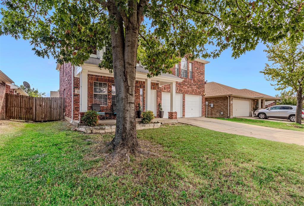 503 Pinto Lane Forney, TX 75126 - Photo 2 of 20 a view of a house with backyard and a tree