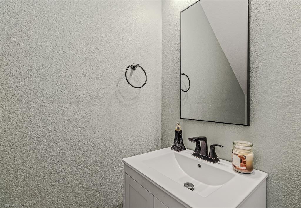 503 Pinto Lane Forney, TX 75126 - Photo 10 of 20 a bathroom with a sink and a mirror