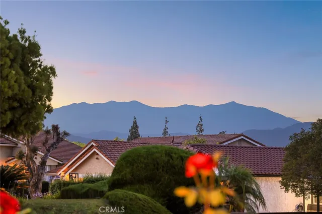 a view of large house with a big yard
