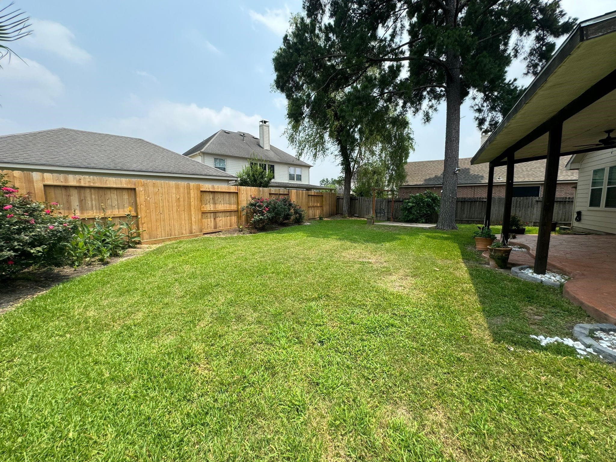 25614 Crisp Spring Lane Spring, TX 77373 - Photo 25 of 25 a front view of a house with a yard and porch