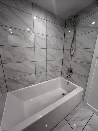 a bathroom with a bathtub