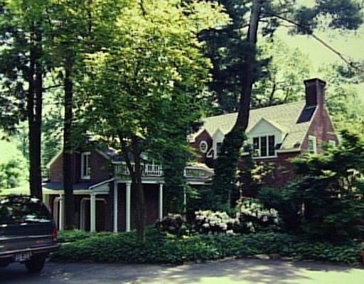 189 Compo Road South Westport, CT 06880 - Photo 1 of 1 front view of house with a tree