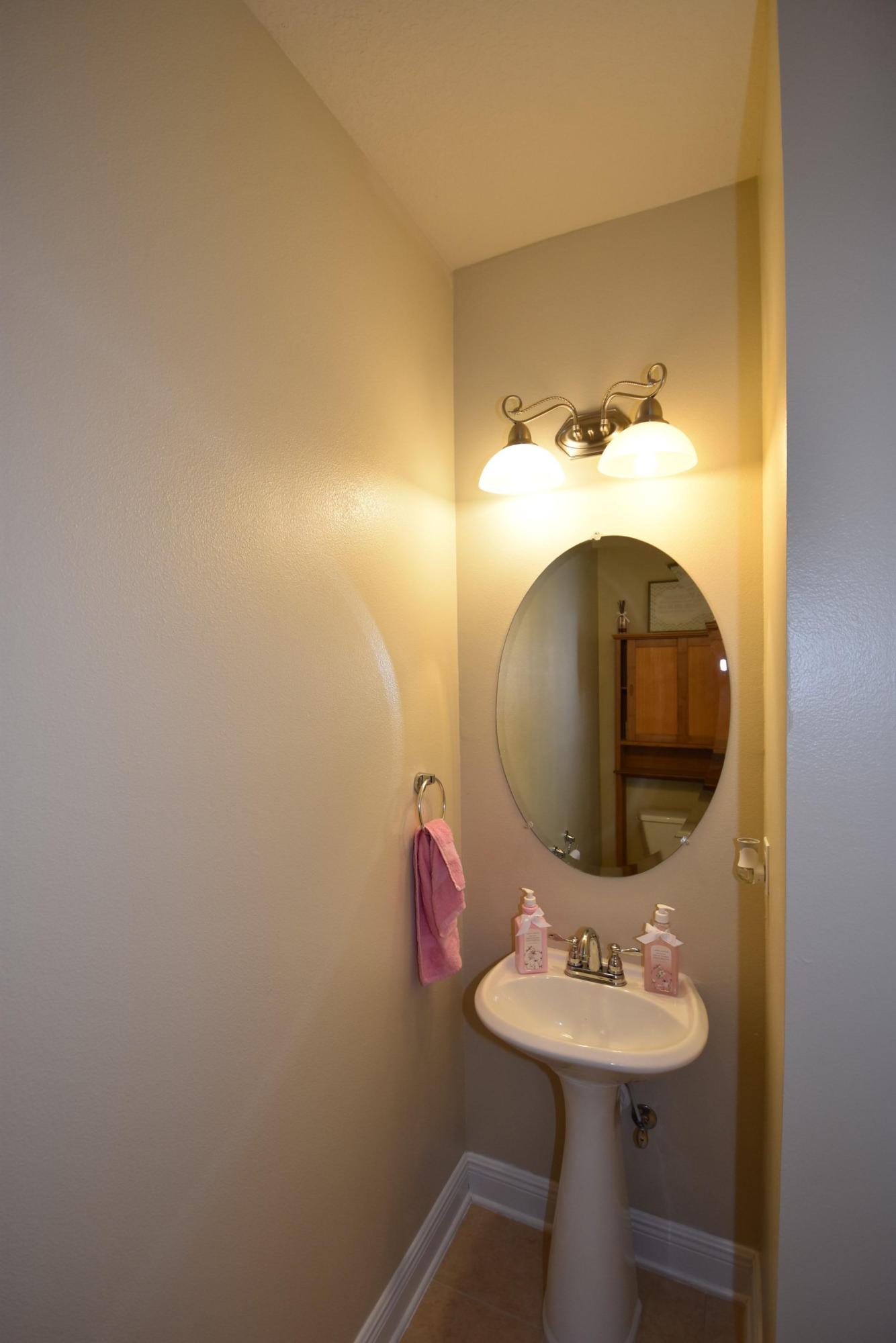 640 Red Fern Road Crestview, FL 32536 - Photo 18 of 50 a bathroom with a sink and mirror