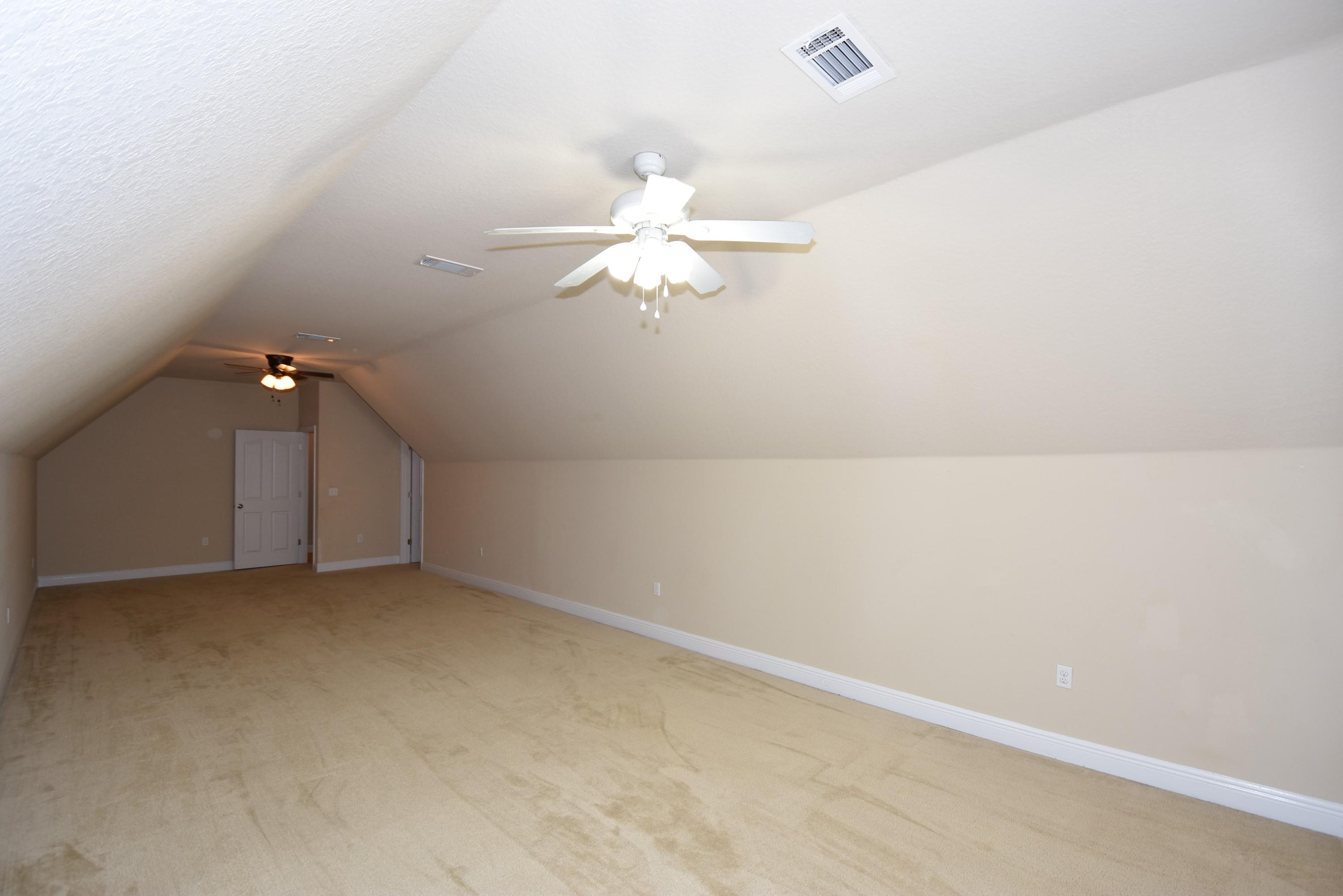 640 Red Fern Road Crestview, FL 32536 - Photo 32 of 50 a view of a small space with a chandelier fan and a chandelier fan