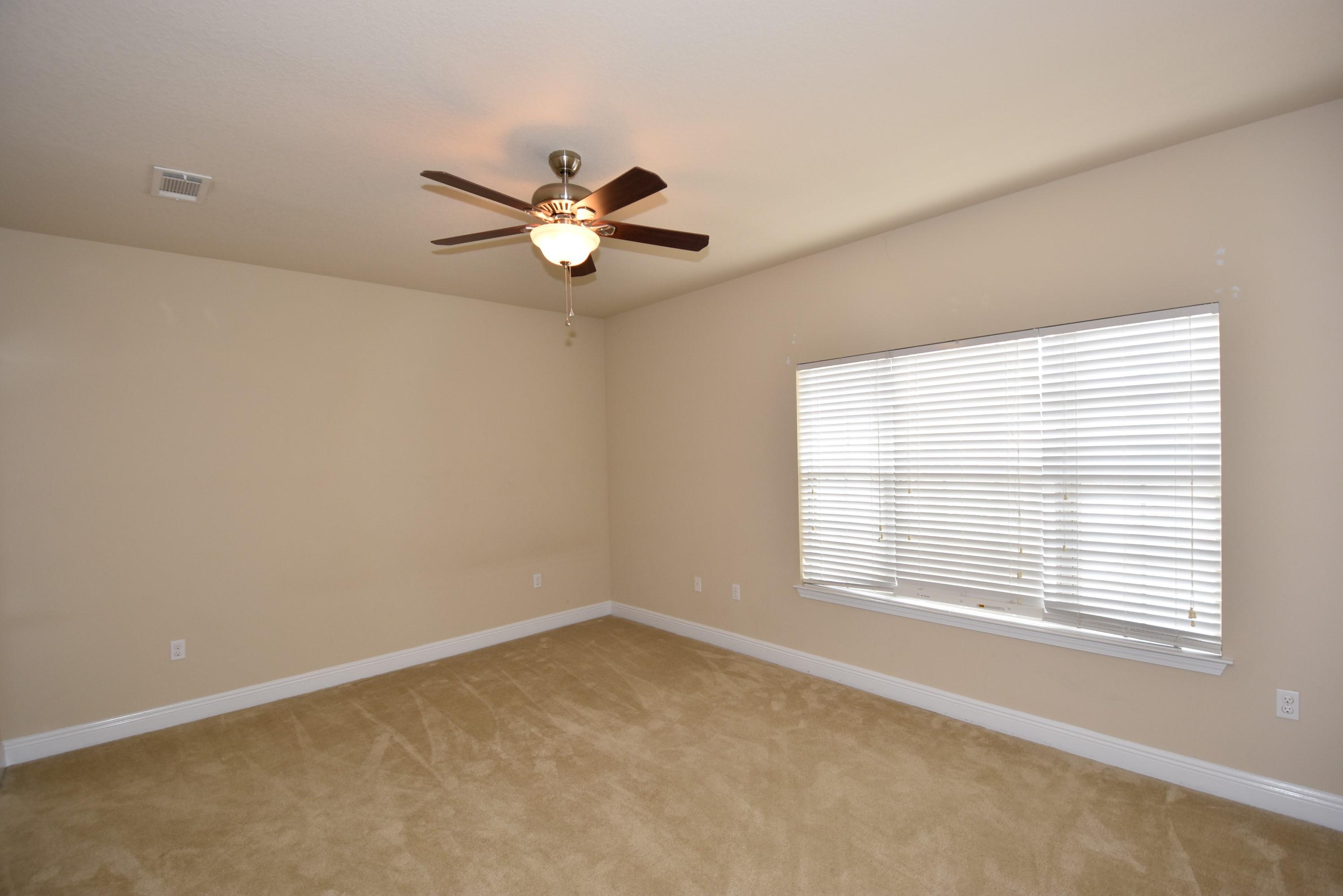 640 Red Fern Road Crestview, FL 32536 - Photo 33 of 50 a view of an empty room with a window