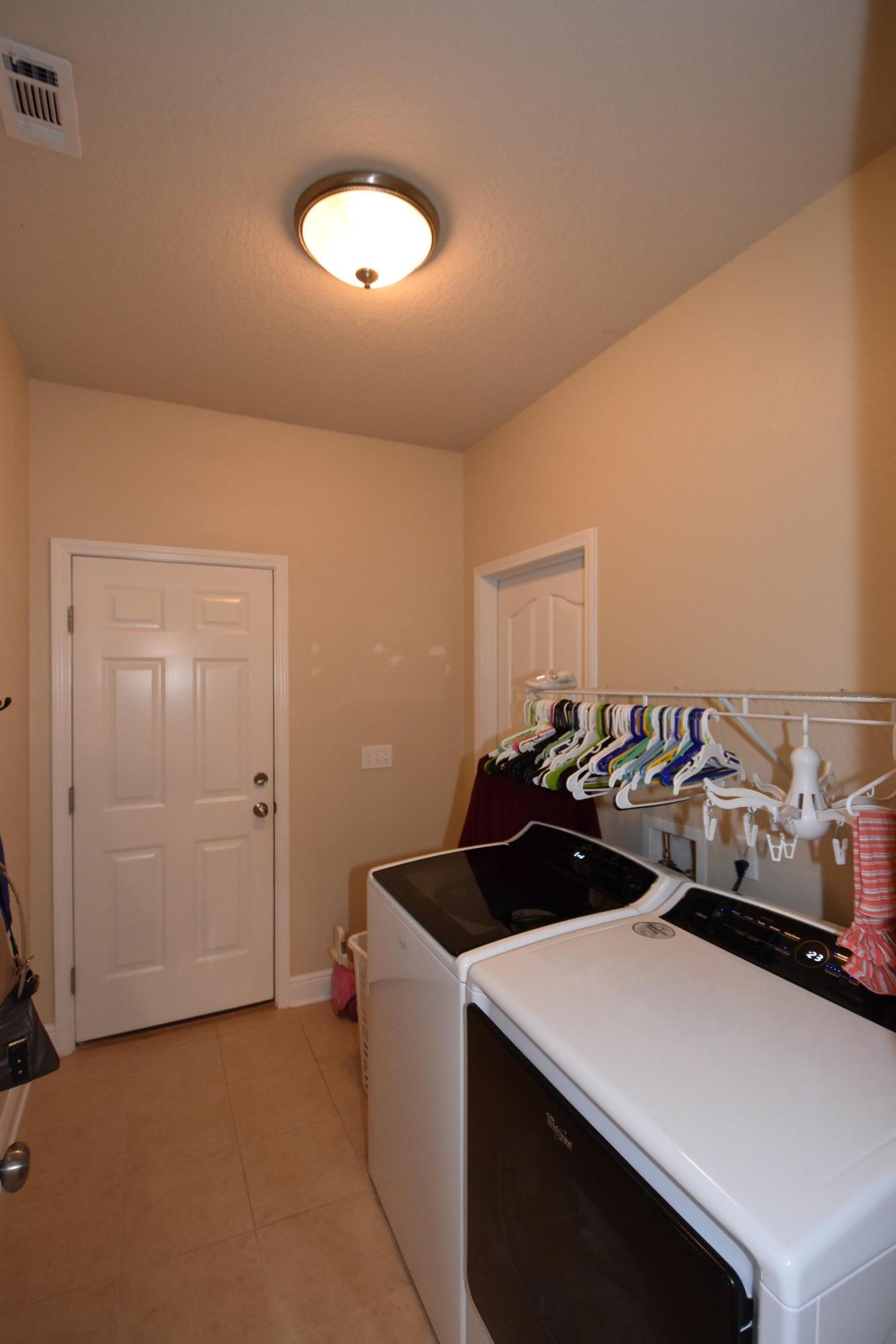 640 Red Fern Road Crestview, FL 32536 - Photo 36 of 50 a kitchen that has a sink and a stove
