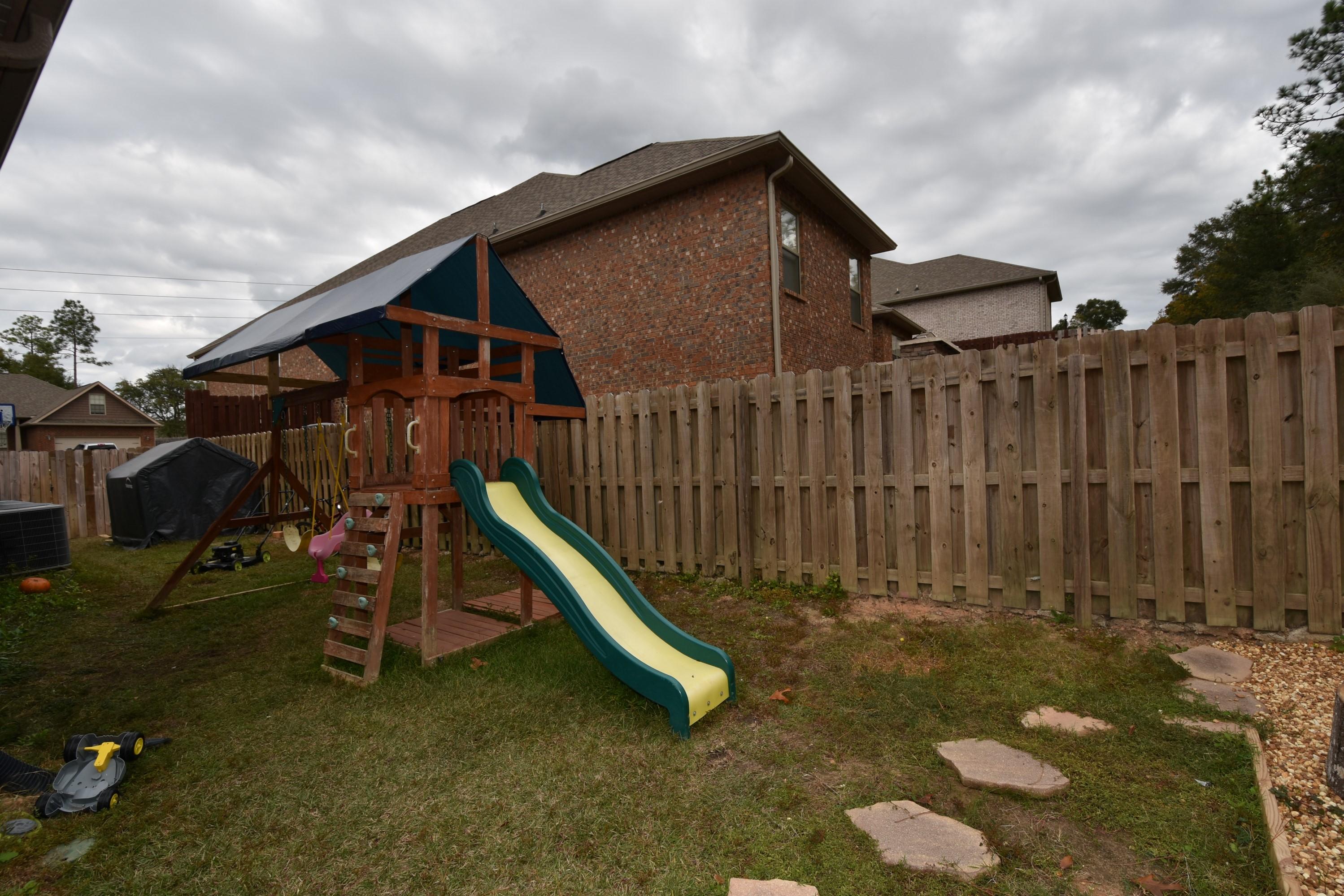 640 Red Fern Road Crestview, FL 32536 - Photo 39 of 50 a view of a house with wooden fence