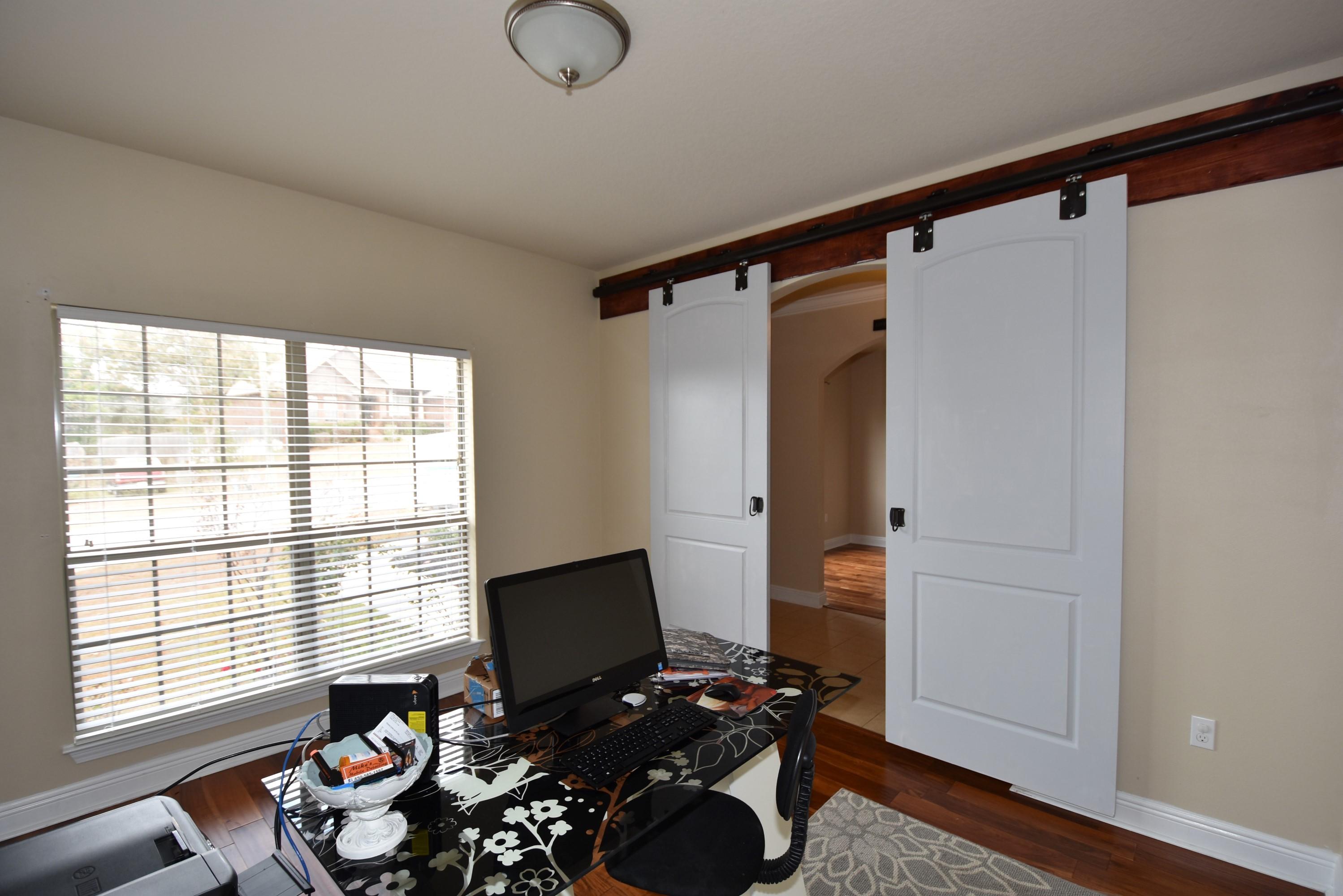 640 Red Fern Road Crestview, FL 32536 - Photo 6 of 50 a view of a workspace with furniture and a window