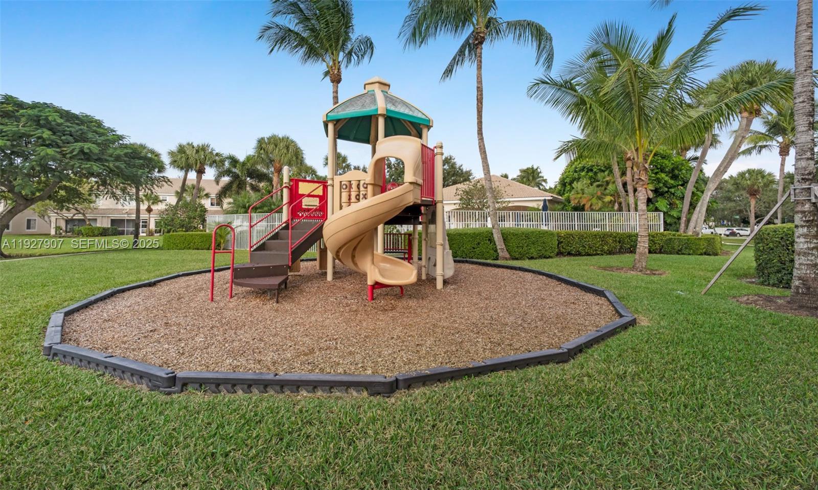 4855 Palmbrooke Circle, Unit 4855 West Palm Beach, FL 33417 - Photo 15 of 40 a view of outdoor space yard and slide