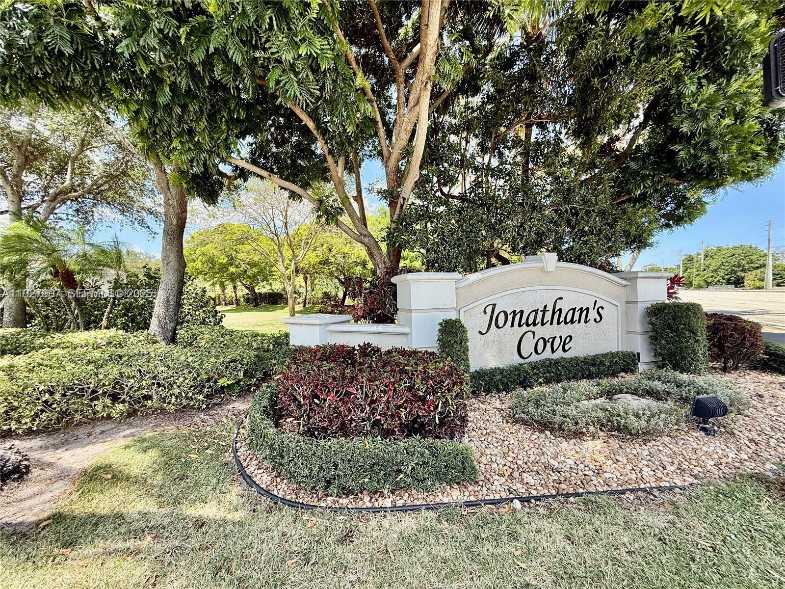 4855 Palmbrooke Circle, Unit 4855 West Palm Beach, FL 33417 - Photo 2 of 40 a view of a park with a tree