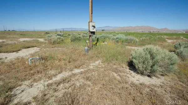 a view of an ocean and mountain