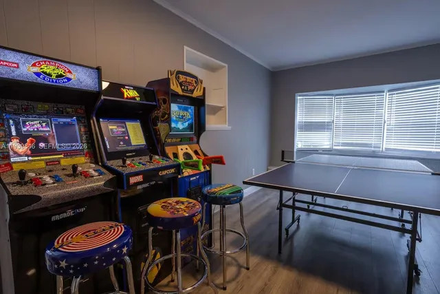 a table room with furniture and a window